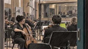 Orchestra recording meditation music in studio