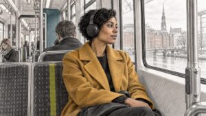 Passenger listening to music aboard a Hamburg tram